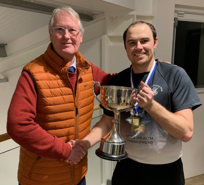 Andrew Scott-Davies presents the silverware to Sean Hannon